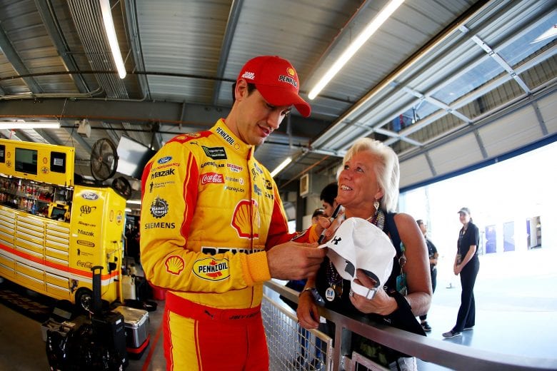 PHOENIX, AZ - NOVEMBER 10:  Joey Logano, driver of the #22 Shell Pennzoil Ford, signs autographs for fans during practice for the Monster Energy NASCAR Cup Series Can-Am 500 at ISM Raceway on November 10, 2018 in Phoenix, Arizona.  (Photo by Sarah Crabill/Getty Images) | Getty Images