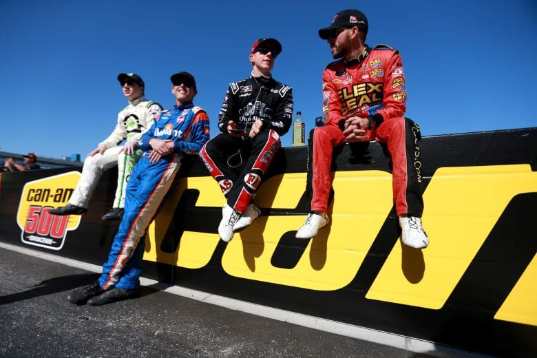 PHOENIX, AZ - NOVEMBER 10:  (L-R)Tyler Reddick, driver of the #9 BurgerFi Chevrolet, Spencer Gallagher, driver of the #23 ISM Connect Chevrolet, John Hunter Nemechek, driver of the #42 Fire Alarm Services Inc. Chevrolet, and Ross Chastain, driver of the #4 Flex Seal Chevrolet, look on from pit road prior to the NASCAR Xfinity Series Whelen Trusted To Perform 200 at ISM Raceway on November 10, 2018 in Phoenix, Arizona.  (Photo by Sean Gardner/Getty Images) | Getty Images