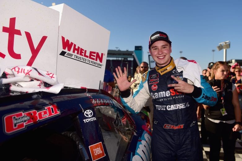 PHOENIX, AZ - NOVEMBER 10:  Christopher Bell, driver of the #20 GameStop Just Cause 4 Toyota, poses with the winner's decal on his car in Victory Lane after winning the NASCAR Xfinity Series Whelen Trusted To Perform 200 at ISM Raceway on November 10, 2018 in Phoenix, Arizona.  (Photo by Jared C. Tilton/Getty Images) | Getty Images