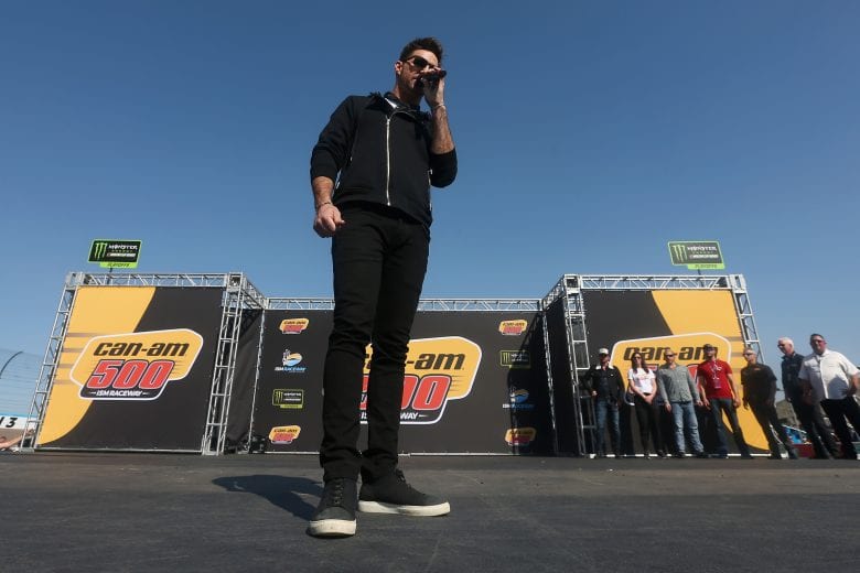 PHOENIX, AZ - NOVEMBER 11:  American singer and songwriter Jake Owen performs driver introductions prior to the Monster Energy NASCAR Cup Series Can-Am 500 at ISM Raceway on November 11, 2018 in Phoenix, Arizona.  (Photo by Sarah Crabill/Getty Images) | Getty Images