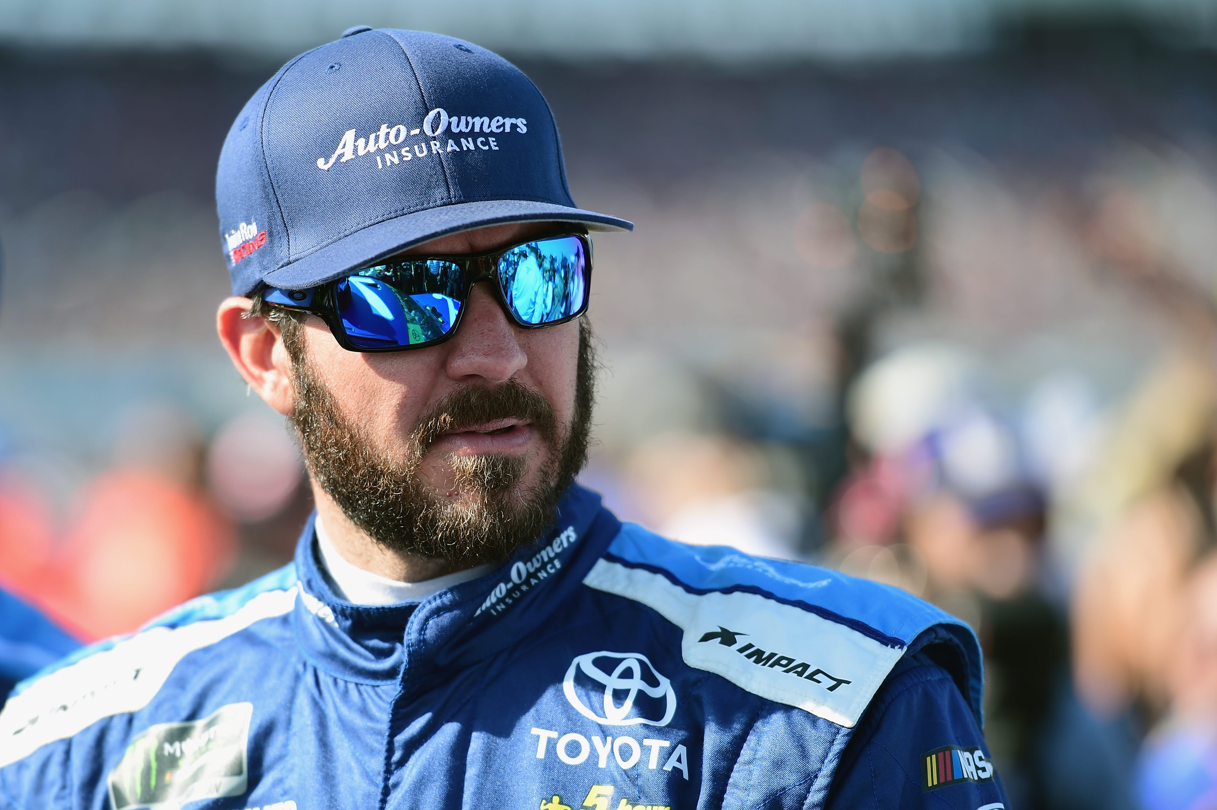PHOENIX, AZ - NOVEMBER 11:  Martin Truex Jr., driver of the #78 Auto-Owners Insurance Toyota, stands on the grid prior to the Monster Energy NASCAR Cup Series Can-Am 500 at ISM Raceway on November 11, 2018 in Phoenix, Arizona.  (Photo by Jared C. Tilton/Getty Images) | Getty Images