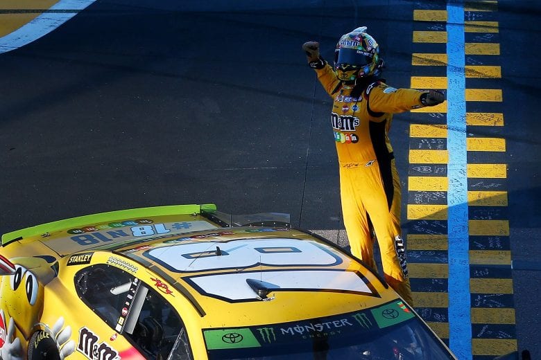 PHOENIX, AZ - NOVEMBER 11:  Kyle Busch, driver of the #18 M&M's Toyota, celebrates after winning the Monster Energy NASCAR Cup Series Can-Am 500 at ISM Raceway on November 11, 2018 in Phoenix, Arizona.  (Photo by Sarah Crabill/Getty Images) | Getty Images