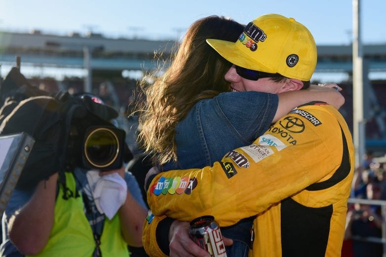 PHOENIX, AZ - NOVEMBER 11:  Kyle Busch, driver of the #18 M&M's Toyota, embraces his wife Samantha in Victory Lane after winning the Monster Energy NASCAR Cup Series Can-Am 500 at ISM Raceway on November 11, 2018 in Phoenix, Arizona.  (Photo by Jared C. Tilton/Getty Images) | Getty Images