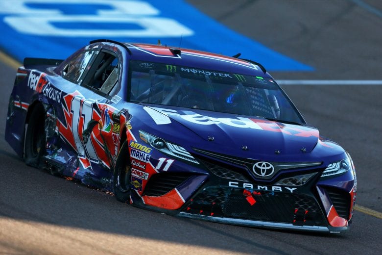 PHOENIX, AZ - NOVEMBER 11:  Denny Hamlin, driver of the #11 FedEx Ground Toyota, drives to pit road after an on-track incident during the Monster Energy NASCAR Cup Series Can-Am 500 at ISM Raceway on November 11, 2018 in Phoenix, Arizona.  (Photo by Sarah Crabill/Getty Images) | Getty Images