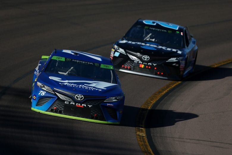 PHOENIX, AZ - NOVEMBER 11:  Martin Truex Jr., driver of the #78 Auto-Owners Insurance Toyota, leads Erik Jones, driver of the #20 Sirius XM Toyota, during the Monster Energy NASCAR Cup Series Can-Am 500 at ISM Raceway on November 11, 2018 in Phoenix, Arizona.  (Photo by Sarah Crabill/Getty Images) | Getty Images
