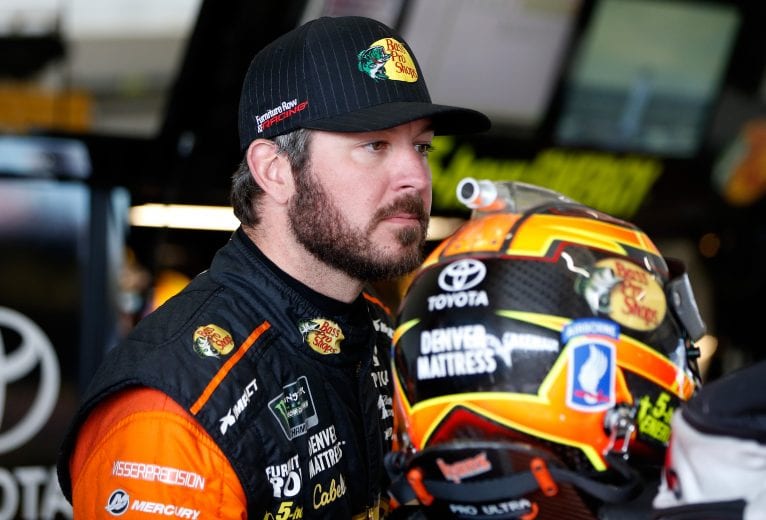 HOMESTEAD, FL - NOVEMBER 16:  Martin Truex Jr., driver of the #78 Bass Pro Shops/5-hour ENERGY Toyota, stands in the garage area during practice for the Monster Energy NASCAR Cup Series Ford EcoBoost 400 at Homestead-Miami Speedway on November 16, 2018 in Homestead, Florida.  (Photo by Brian Lawdermilk/Getty Images) | Getty Images