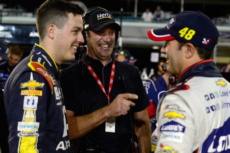 HOMESTEAD, FL - NOVEMBER 16:  Alex Bowman, driver of the #88 Axalta Chevrolet, talks to Jimmie Johnson, driver of the #48 Lowe's Rookie Throwback Chevrolet, during qualifying for the Monster Energy NASCAR Cup Series Ford EcoBoost 400 at Homestead-Miami Speedway on November 16, 2018 in Homestead, Florida.  (Photo by Robert Laberge/Getty Images) | Getty Images