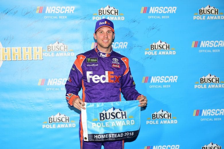 HOMESTEAD, FL - NOVEMBER 16:  Denny Hamlin, driver of the #11 FedEx Express Toyota, poses with the poll award after qualifying for the Monster Energy NASCAR Cup Series Ford EcoBoost 400 at Homestead-Miami Speedway on November 16, 2018 in Homestead, Florida.  (Photo by Jared C. Tilton/Getty Images) | Getty Images