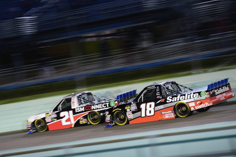 HOMESTEAD, FL - NOVEMBER 16:  Johnny Sauter, driver of the #21 ISM Connect Chevrolet, leads Noah Gragson, driver of the #18 Safelite AutoGlass Toyota, during the NASCAR Camping World Truck Series Ford EcoBoost 200 at Homestead-Miami Speedway on November 16, 2018 in Homestead, Florida.  (Photo by Jared C. Tilton/Getty Images) | Getty Images