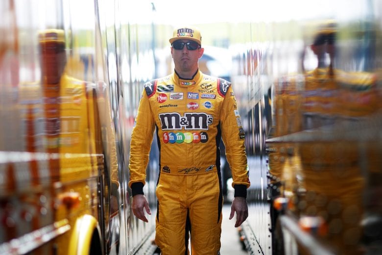 HOMESTEAD, FL - NOVEMBER 17:  Kyle Busch, driver of the #18 M&M's Toyota, walks through the garage area during practice for the Monster Energy NASCAR Cup Series Ford EcoBoost 400 at Homestead-Miami Speedway on November 17, 2018 in Homestead, Florida.  (Photo by Chris Graythen/Getty Images) | Getty Images