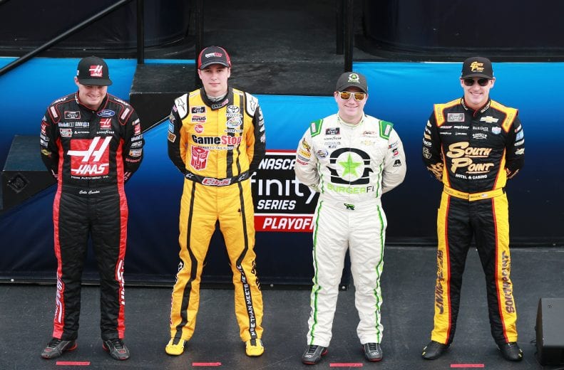 HOMESTEAD, FL - NOVEMBER 17:  Cole Custer, driver of the #00 Haas Automation Ford, Christopher Bell, driver of the #20 GameStop Transformers Toyota, Tyler Reddick, driver of the #9 BurgerFi Chevrolet, and Daniel Hemric, driver of the #21 South Point Hotel & Casino Chevrolet, take part in pre-race ceremonies for the NASCAR Xfinity Series Ford EcoBoost 300 at Homestead-Miami Speedway on November 17, 2018 in Homestead, Florida.  (Photo by Sean Gardner/Getty Images) | Getty Images