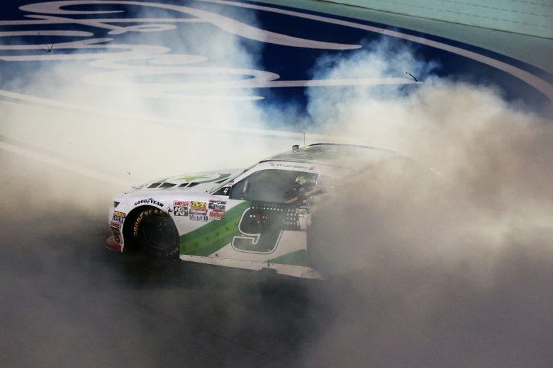 HOMESTEAD, FL - NOVEMBER 17:  Tyler Reddick, driver of the #9 BurgerFi Chevrolet, celebrates with a burnout after winning the NASCAR Xfinity Series Ford EcoBoost 300 and the NASCAR Xfinity Series Championship at Homestead-Miami Speedway on November 17, 2018 in Homestead, Florida.  (Photo by Sean Gardner/Getty Images) | Getty Images