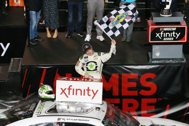HOMESTEAD, FL - NOVEMBER 17:  Tyler Reddick, driver of the #9 BurgerFi Chevrolet, celebrates in victory lane after winning the NASCAR Xfinity Series Ford EcoBoost 300 and the NASCAR Xfinity Series Championship at Homestead-Miami Speedway on November 17, 2018 in Homestead, Florida.  (Photo by Sean Gardner/Getty Images) | Getty Images