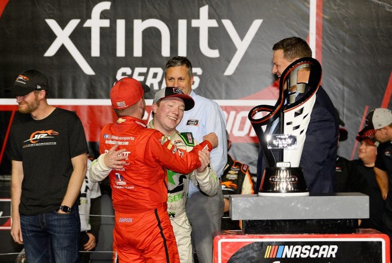 HOMESTEAD, FL - NOVEMBER 17:  Tyler Reddick, driver of the #9 BurgerFi Chevrolet, gets a hug from Justin Allgaier, driver of the #7 BRANDT Professional Agriculture Chevrolet, in Victory Lane after winning the NASCAR Xfinity Series Ford EcoBoost 300 at Homestead-Miami Speedway on November 17, 2018 in Homestead, Florida.  (Photo by Robert Laberge/Getty Images) | Getty Images