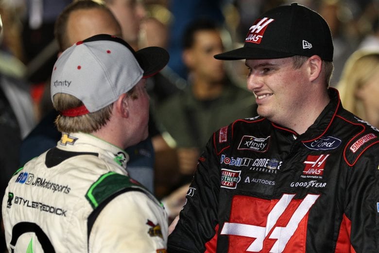 HOMESTEAD, FL - NOVEMBER 17:  Tyler Reddick, driver of the #9 BurgerFi Chevrolet, is congratulated by Cole Custer, driver of the #00 Haas Automation Ford, after winning the NASCAR Xfinity Series Ford EcoBoost 300 at Homestead-Miami Speedway on November 17, 2018 in Homestead, Florida.  (Photo by Chris Graythen/Getty Images) | Getty Images