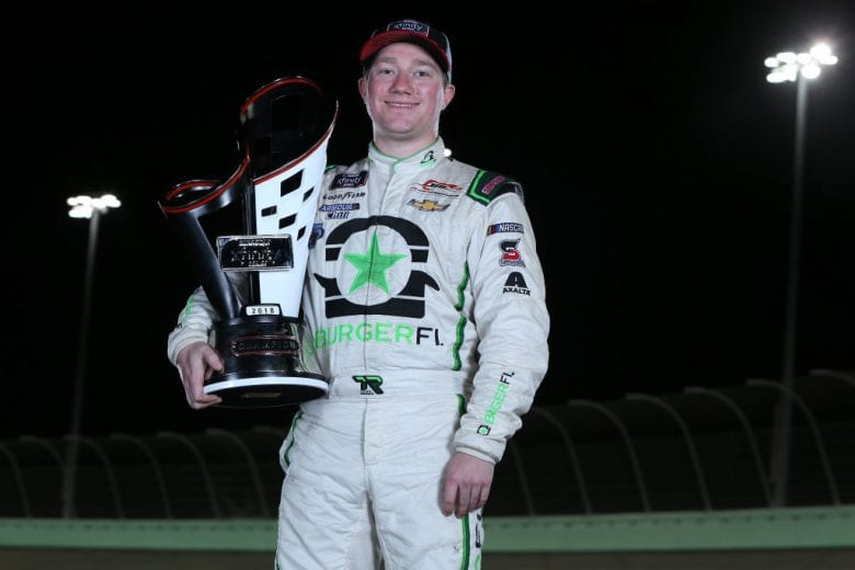 HOMESTEAD, FL - NOVEMBER 17:  Tyler Reddick, driver of the #9 BurgerFi Chevrolet, poses for a photo after winning during the NASCAR Xfinity Series Ford EcoBoost 300 and the NASCAR Xfinity Series Championship at Homestead-Miami Speedway on November 17, 2018 in Homestead, Florida.  (Photo by Brian Lawdermilk/Getty Images) | Getty Images