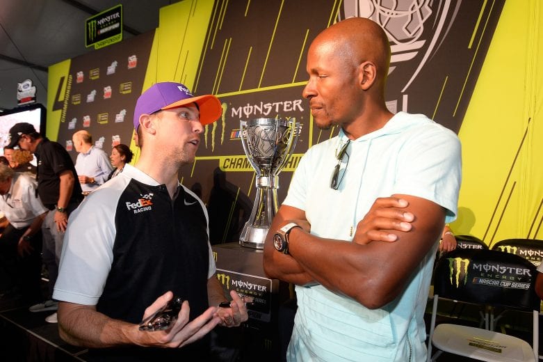 HOMESTEAD, FL - NOVEMBER 18:  Denny Hamlin, driver of the #11 FedEx Express Toyota, talks to NBA Hall or Famer Ray Allen at the driver's meeting prior to the Monster Energy NASCAR Cup Series Ford EcoBoost 400 at Homestead-Miami Speedway on November 18, 2018 in Homestead, Florida.  (Photo by Robert Laberge/Getty Images) | Getty Images