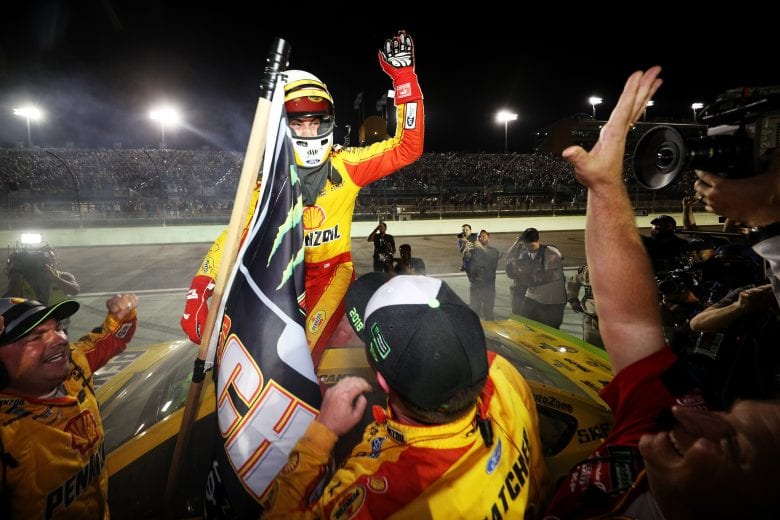 HOMESTEAD, FL - NOVEMBER 18:  Joey Logano, driver of the #22 Shell Pennzoil Ford, celebrates after winning the Monster Energy NASCAR Cup Series Ford EcoBoost 400 and the Monster Energy NASCAR Cup Series Championship at Homestead-Miami Speedway on November 18, 2018 in Homestead, Florida.  (Photo by Chris Graythen/Getty Images) | Getty Images