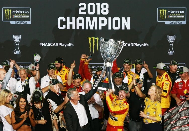 HOMESTEAD, FL - NOVEMBER 18:  Joey Logano, driver of the #22 Shell Pennzoil Ford, celebrates in victory lane after winning the Monster Energy NASCAR Cup Series Ford EcoBoost 400 and the Monster Energy NASCAR Cup Series Championship at Homestead-Miami Speedway on November 18, 2018 in Homestead, Florida.  (Photo by Sean Gardner/Getty Images) | Getty Images