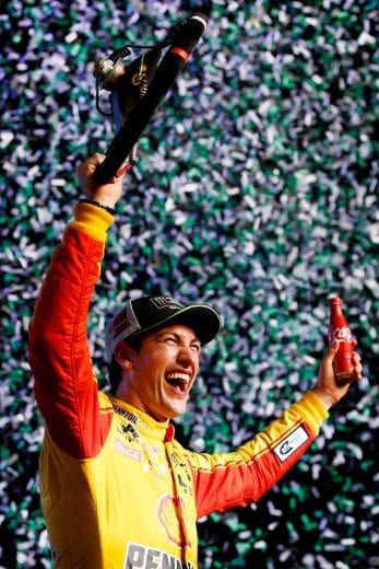 HOMESTEAD, FL - NOVEMBER 18:  Joey Logano, driver of the #22 Shell Pennzoil Ford, celebrates in victory lane after winning the Monster Energy NASCAR Cup Series Ford EcoBoost 400 and the Monster Energy NASCAR Cup Series Championship at Homestead-Miami Speedway on November 18, 2018 in Homestead, Florida.  (Photo by Chris Trotman/Getty Images) | Getty Images