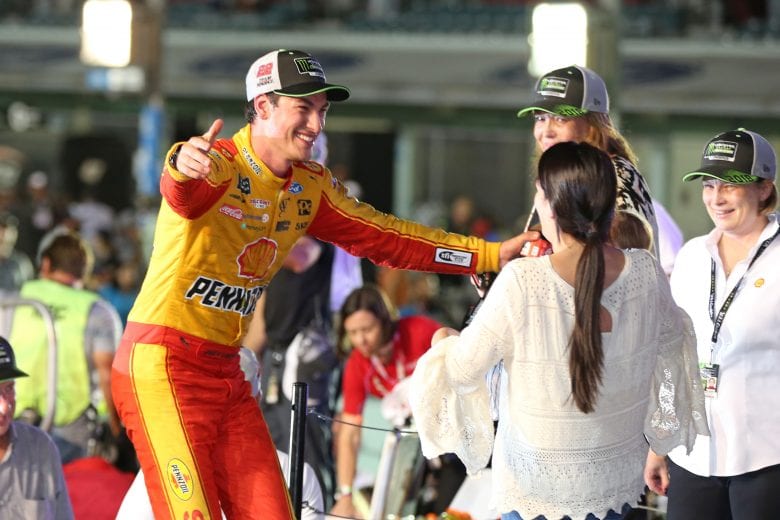 HOMESTEAD, FL - NOVEMBER 18:  Joey Logano, driver of the #22 Shell Pennzoil Ford, celebrates with his wife, Brittany, and son, Hudson, after winning the Monster Energy NASCAR Cup Series Ford EcoBoost 400 at Homestead-Miami Speedway on November 18, 2018 in Homestead, Florida.  (Photo by Matt Sullivan/Getty Images) | Getty Images