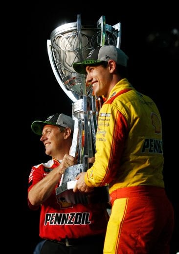 HOMESTEAD, FL - NOVEMBER 18:  Joey Logano, driver of the #22 Shell Pennzoil Ford, and crew chief Todd Gordon celebrate with the trophy after winning the Monster Energy NASCAR Cup Series Ford EcoBoost 400 and the Monster Energy NASCAR Cup Series Championship at Homestead-Miami Speedway on November 18, 2018 in Homestead, Florida.  (Photo by Chris Trotman/Getty Images) | Getty Images