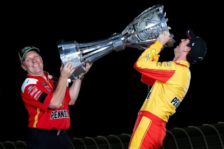 HOMESTEAD, FL - NOVEMBER 18:  Joey Logano, driver of the #22 Shell Pennzoil Ford, and crew chief Todd Gordon pose for a photo after winning the Monster Energy NASCAR Cup Series Ford EcoBoost 400 and the Monster Energy NASCAR Cup Series Championship at Homestead-Miami Speedway on November 18, 2018 in Homestead, Florida.  (Photo by Brian Lawdermilk/Getty Images) | Getty Images