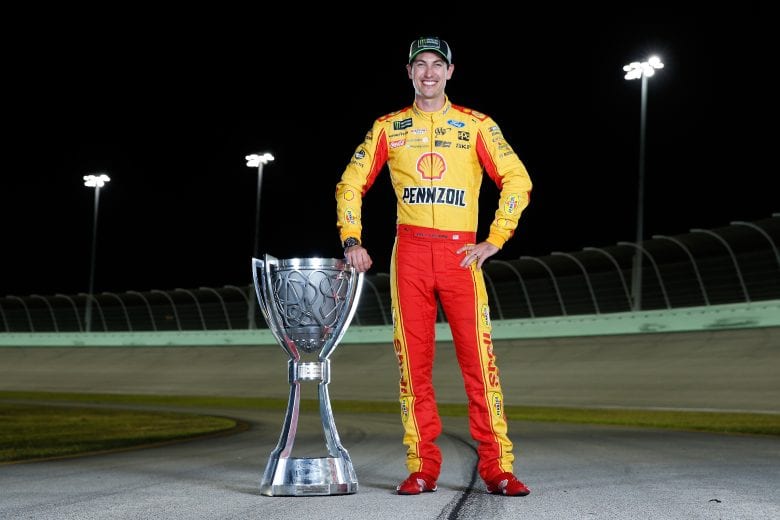 HOMESTEAD, FL - NOVEMBER 18:  Joey Logano, driver of the #22 Shell Pennzoil Ford, poses for a photo after winning the Monster Energy NASCAR Cup Series Ford EcoBoost 400 and the Monster Energy NASCAR Cup Series Championship at Homestead-Miami Speedway on November 18, 2018 in Homestead, Florida.  (Photo by Brian Lawdermilk/Getty Images) | Getty Images