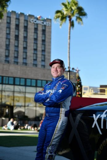 ORLANDO, FLORIDA - NOVEMBER 27: 2018 NASCAR Xfinity Series Champion Tyler Reddick poses with the Xfinity car in Universal Studios at Universal Orlando Resort on November 27, 2018 in Orlando, Florida. (Photo by Julio Aguilar/Getty Images) | Getty Images