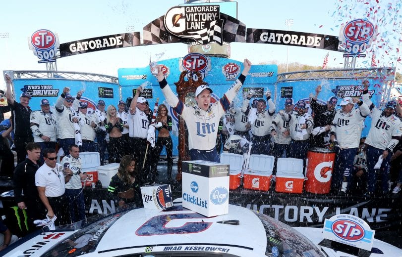 MARTINSVILLE, VA - APRIL 02: Brad Keselowski, driver of the #2 Miller Lite Ford, celebrates in Victory Lane after winning the Monster Energy NASCAR Cup Series STP 500 at Martinsville Speedway on April 2, 2017 in Martinsville, Virginia. (Photo by Jerry Markland/Getty Images) | Getty Images