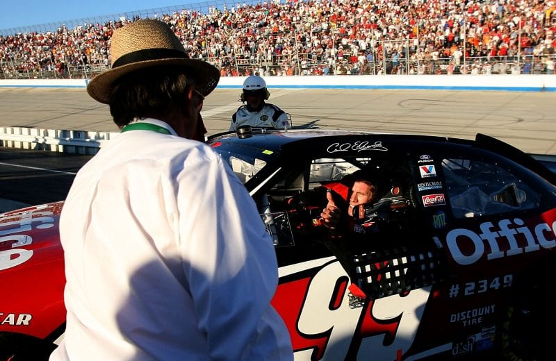 DOVER, DE - SEPTEMBER 23: Team owner Jack Roush (L) congratulates Carl Edwards, driver of the #99 Office Depot Ford, after winning the NASCAR Nextel Cup Series Dodge Dealers 400 at Dover International Speedway on September 23, 2007 in Dover, Delaware. (Photo by Nick Laham/Getty Images) | Getty Images