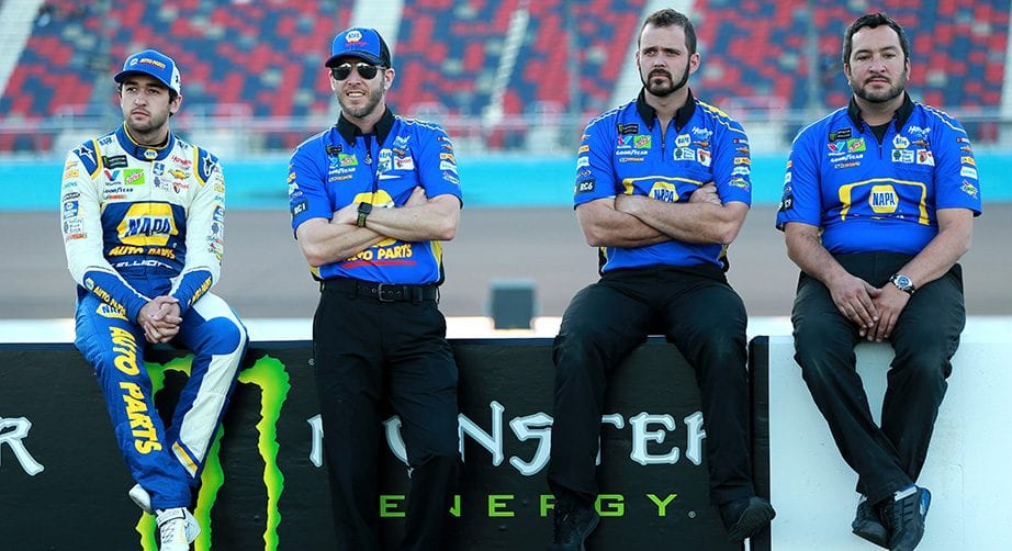Chase Elliott hangs with his No. 9 crew before qualifying at ISM Raceway.