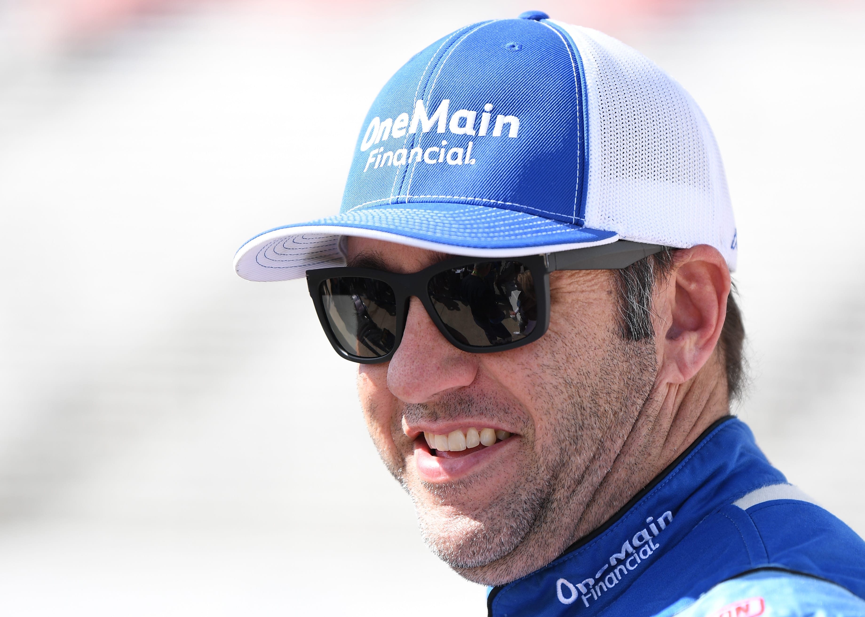 Elliott Sadler shares a smile on pit road.