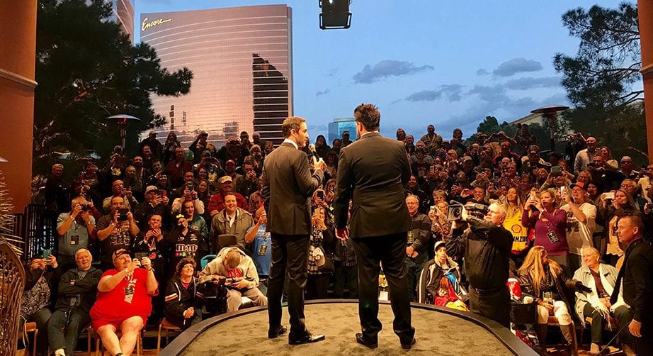 Jimmie Johnson talks with fans outside of the Wynn Las Vegas with Daryl Motte.
