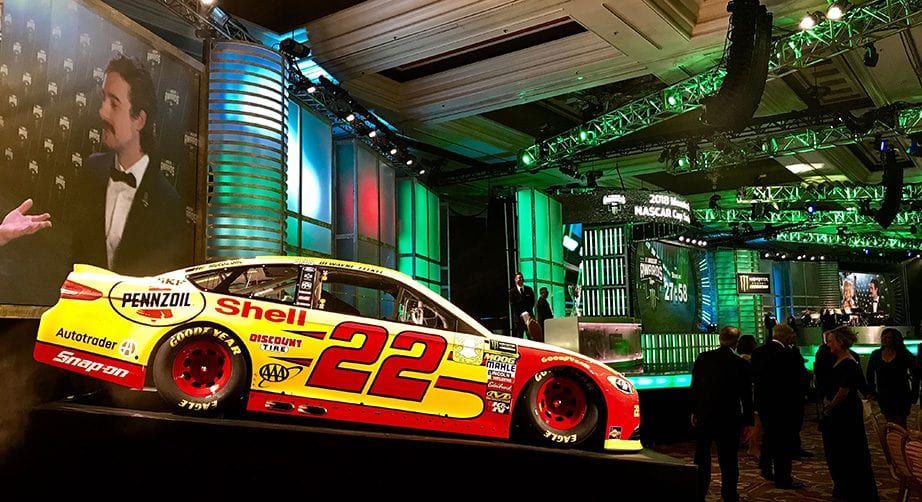 Joey Logano's car sits in the ballroom at the Wynn Las Vegas.