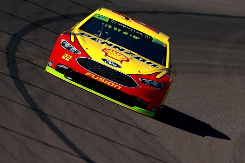 Joey Logano takes a lap during practice at ISM Raceway.