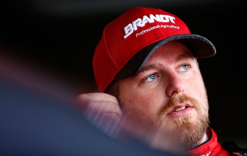 Justin Allgaier gets ready to climb into the No. 7 Chevrolet at Dover.