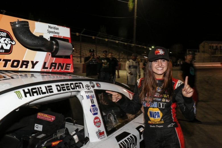 MERIDIAN ID - SEPTEMBER 29: Hailie Deegan, driver of the #19 NAPA Power Premium Plus Toyota, applies her victory sticker at the conclusion of the NASCAR K&N Series West NAPA Auto Parts Idaho 208 at Meridian Speedway on September 29, 2018 in Meridian, Idaho. (Photo by Loren Orr/Getty Images for NASCAR)