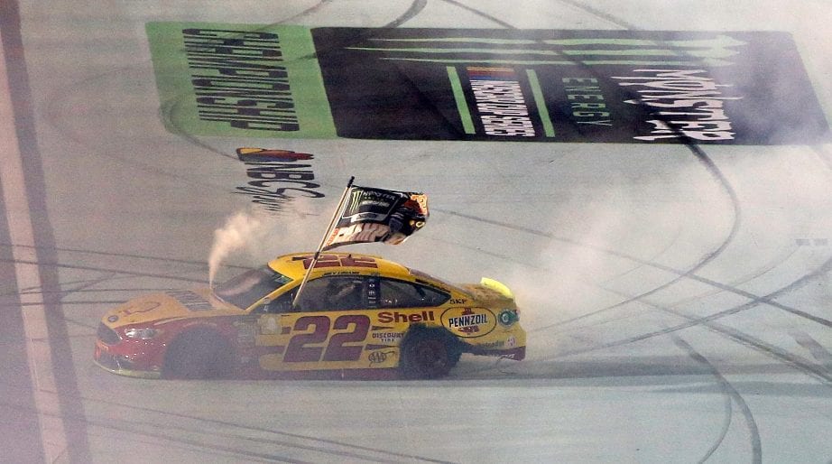 HOMESTEAD, FL - NOVEMBER 18: Joey Logano, driver of the #22 Shell Pennzoil Ford, celebrates with a burnout after winning the Monster Energy NASCAR Cup Series Ford EcoBoost 400 and the Monster Energy NASCAR Cup Series Championship at Homestead-Miami Speedway on November 18, 2018 in Homestead, Florida. (Photo by Brian Lawdermilk/Getty Images) | Getty Images