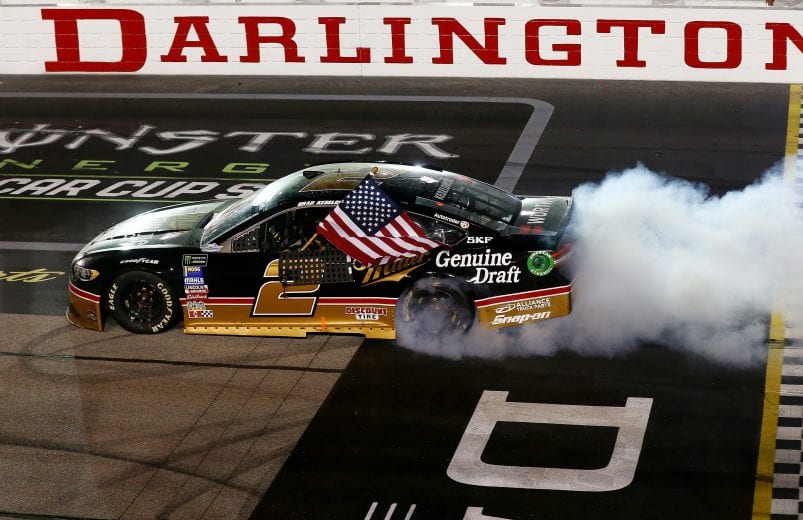 DARLINGTON, SC - SEPTEMBER 02: Brad Keselowski, driver of the #2 Miller Genuine Draft Ford, celebrates with a burnout after winning the Monster Energy NASCAR Cup Series Bojangles' Southern 500 at Darlington Raceway on September 2, 2018 in Darlington, South Carolina. (Photo by Sarah Crabill/Getty Images) | Getty Images