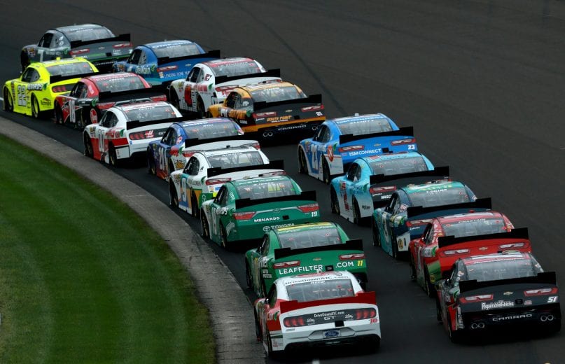 INDIANAPOLIS, IN - SEPTEMBER 10:  Ryan Blaney, driver of the #22 Menards/Richmond Ford, and Justin Allgaier, driver of the #7 Dove Men  Care Chevrolet, lead the field to start the NASCAR Xfinity Series Lilly Diabetes 250  at Indianapolis Motor Speedway on September 10, 2018 in Indianapolis, Indiana.  (Photo by Sean Gardner/Getty Images) | Getty Images