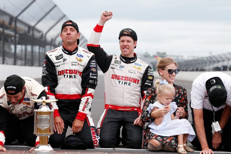 INDIANAPOLIS, IN - SEPTEMBER 10: Brad Keselowski, driver of the #2 Discount Tire Ford, celebrates after winning the Monster Energy NASCAR Cup Series Big Machine Vodka 400 at the Brickyard at Indianapolis Motor Speedway on September 10, 2018 in Indianapolis, Indiana. (Photo by Brian Lawdermilk/Getty Images) | Getty Images
