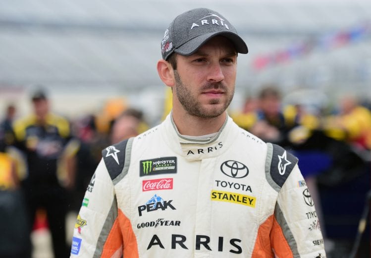 DOVER, DE - OCTOBER 05: Daniel Suarez, driver of the #19 ARRIS Toyota, looks on during qualifying for the Monster Energy NASCAR Cup Series Gander Outdoors 400 at Dover International Speedway on October 5, 2018 in Dover, Delaware. (Photo by Jared C. Tilton/Getty Images) | Getty Images