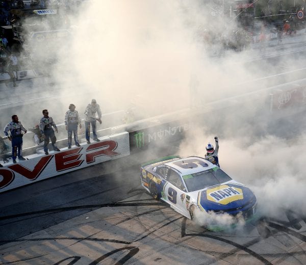 DOVER, DE - OCTOBER 07:  Chase Elliott, driver of the #9 NAPA Auto Parts Chevrolet, celebrates with a burnout after winning the Monster Energy NASCAR Cup Series Gander Outdoors 400 at Dover International Speedway on October 7, 2018 in Dover, Delaware.  (Photo by Chris Trotman/Getty Images) | Getty Images