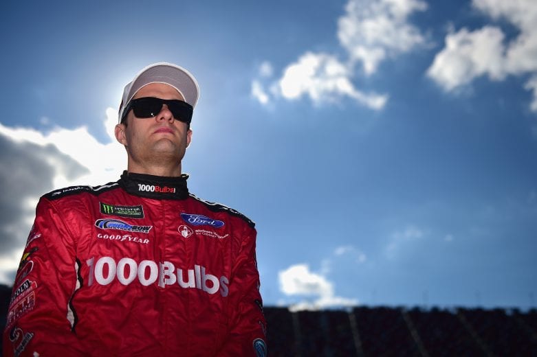 TALLADEGA, AL - OCTOBER 13: David Ragan, driver of the #38 1000Bulbs.com Ford, stands by his car during qualifying for the Monster Energy NASCAR Cup Series 1000Bulbs.com 500 at Talladega Superspeedway on October 13, 2018 in Talladega, Alabama. (Photo by Jared C. Tilton/Getty Images) | Getty Images