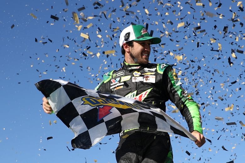 KANSAS CITY, KS - OCTOBER 21: Chase Elliott, driver of the #9 Mountain Dew Chevrolet, celebrates in victory lane after winning the Monster Energy NASCAR Cup Series Hollywood Casino 400 at Kansas Speedway on October 21, 2018 in Kansas City, Kansas. (Photo by Chris Graythen/Getty Images) | Getty Images