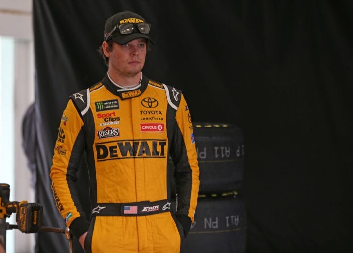 HOMESTEAD, FL - NOVEMBER 16: Erik Jones, driver of the #20 DeWalt Toyota, stands in the garage during practice for the Monster Energy NASCAR Cup Series Ford EcoBoost 400 at Homestead-Miami Speedway on November 16, 2018 in Homestead, Florida. (Photo by Matt Sullivan/Getty Images) | Getty Images