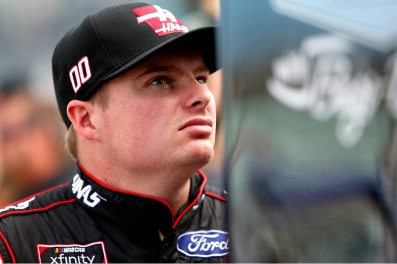 HOMESTEAD, FL - NOVEMBER 17:  Cole Custer, driver of the #00 Haas Automation Ford, stands by his car during qualifying for the NASCAR Xfinity Series Ford EcoBoost 300 at Homestead-Miami Speedway on November 17, 2018 in Homestead, Florida.  (Photo by Sean Gardner/Getty Images) | Getty Images