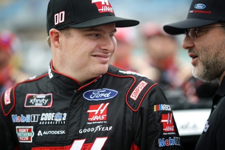 HOMESTEAD, FL - NOVEMBER 17:  Cole Custer, driver of the #00 Haas Automation Ford, stands with team owner Tony Stewart during pre-race ceremonies for the NASCAR Xfinity Series Ford EcoBoost 300 at Homestead-Miami Speedway on November 17, 2018 in Homestead, Florida.  (Photo by Chris Graythen/Getty Images) | Getty Images