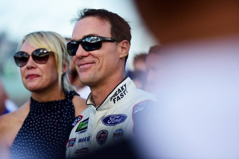 HOMESTEAD, FL - NOVEMBER 18: Kevin Harvick, driver of the #4 Jimmy John's Ford, and wife DeLana Harvick take part in pre-race ceremonies for during the Monster Energy NASCAR Cup Series Ford EcoBoost 400 at Homestead-Miami Speedway on November 18, 2018 in Homestead, Florida. (Photo by Jared C. Tilton/Getty Images) | Getty Images